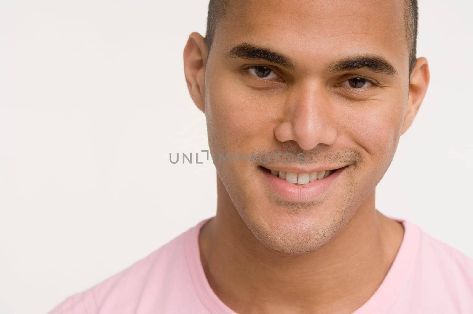 Portrait of young man looking at camera