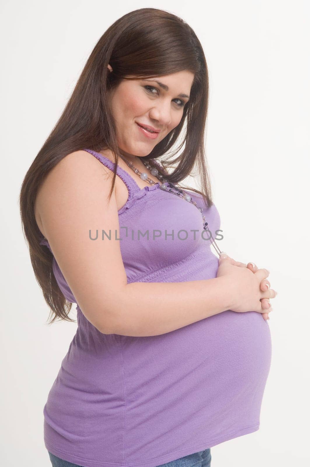 Portrait of young pregnant woman
