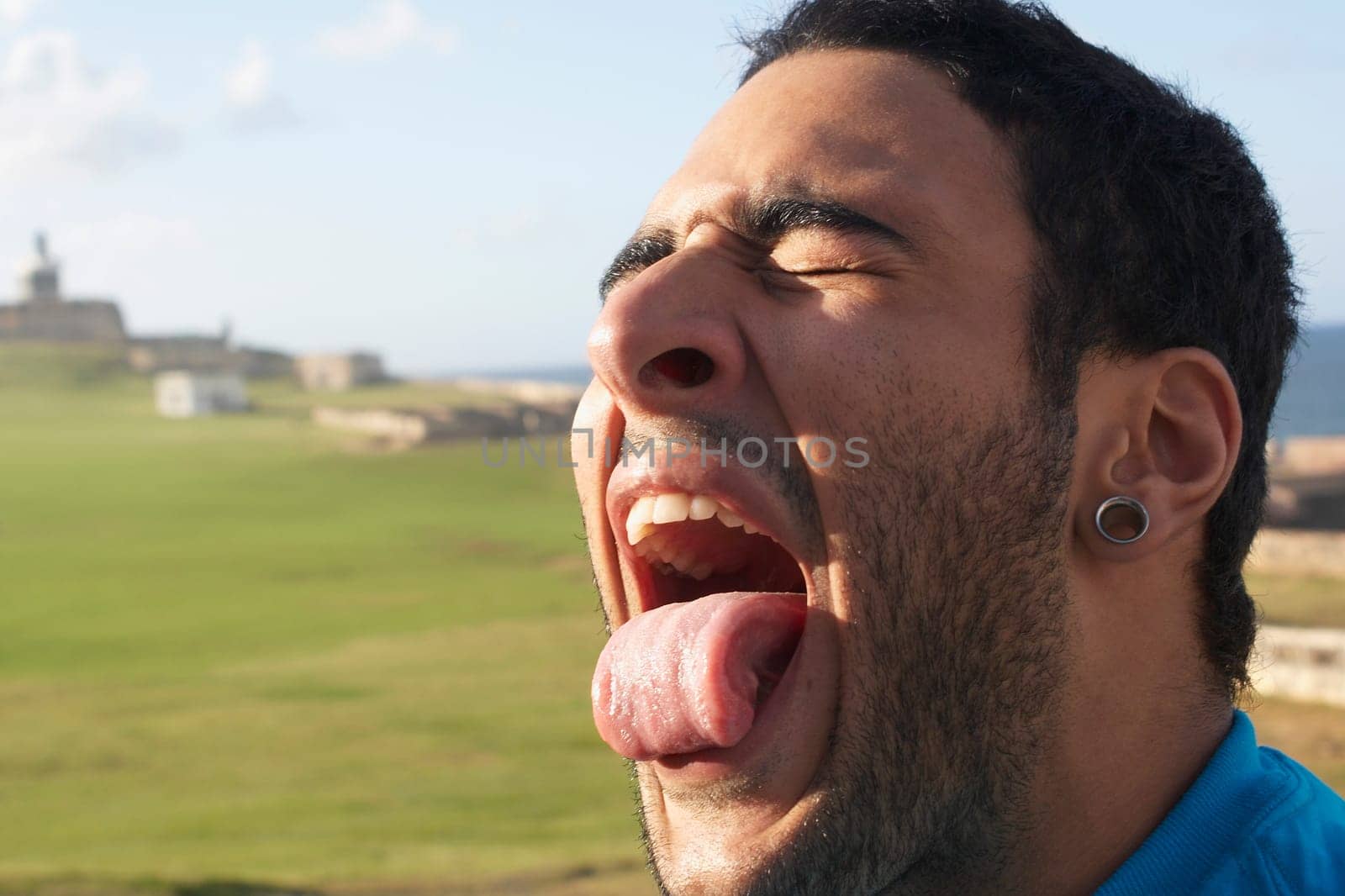 Young man making faces