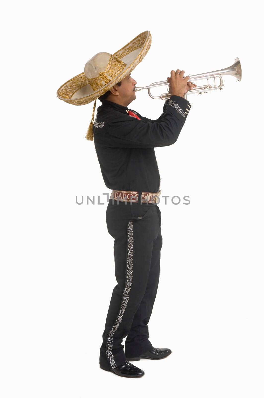 Portrait of Mariachi playing trumpet