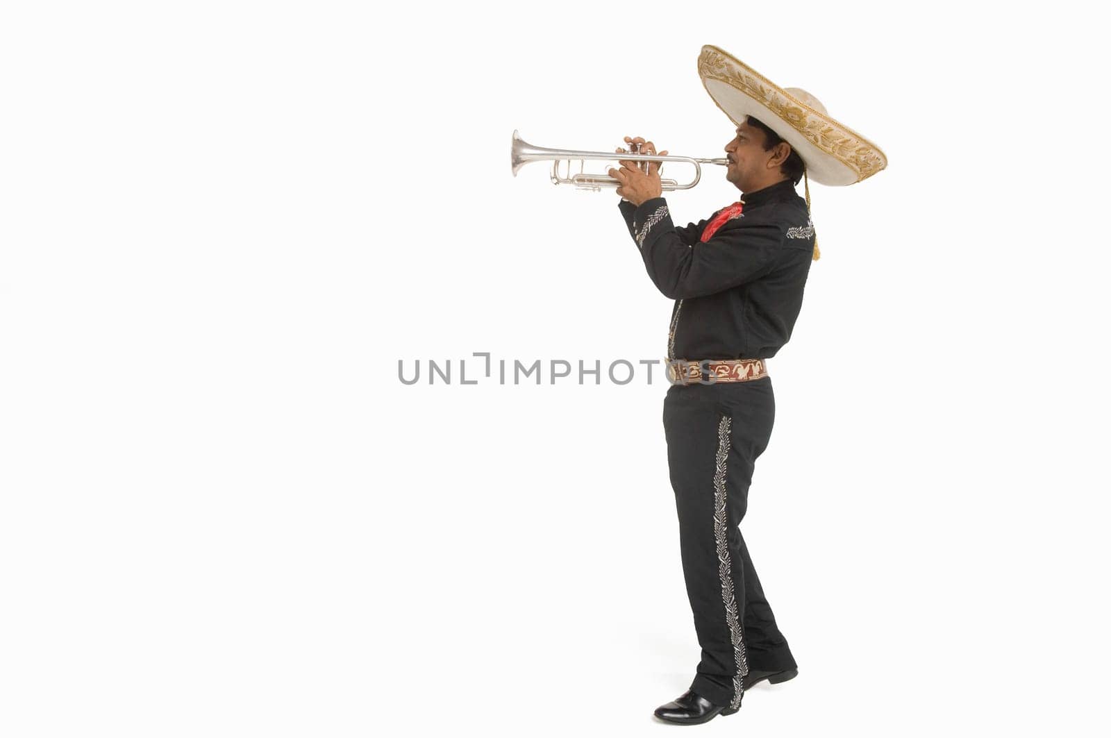 Portrait of Mariachi playing trumpet