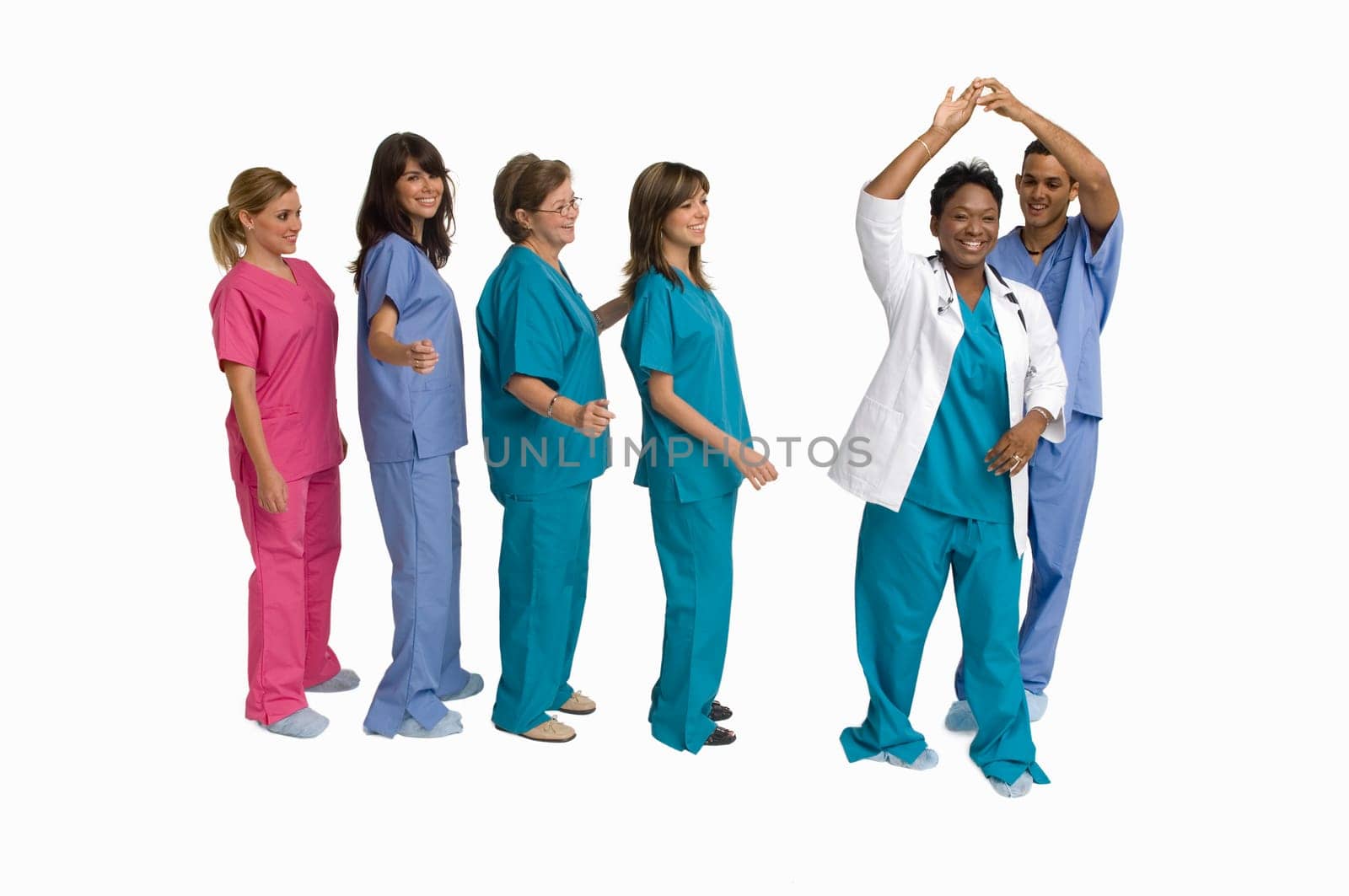 Group portrait of doctors and nurses dancing
