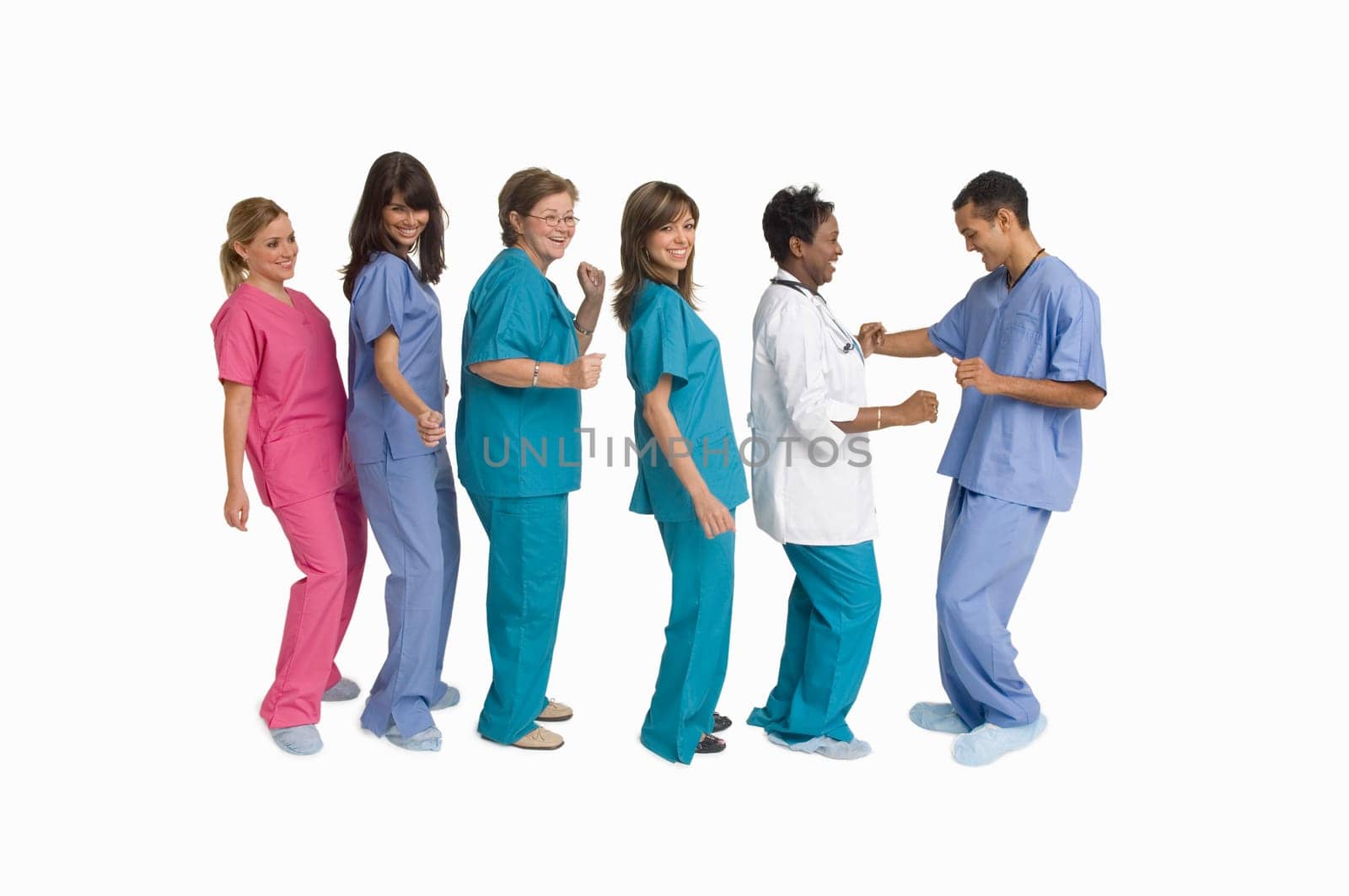 Group portrait of doctors and nurses dancing