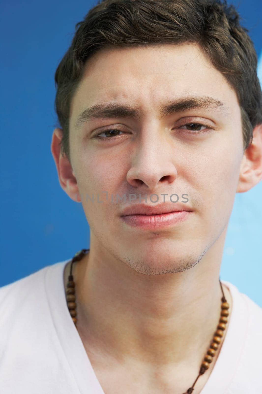 Young man looking at camera