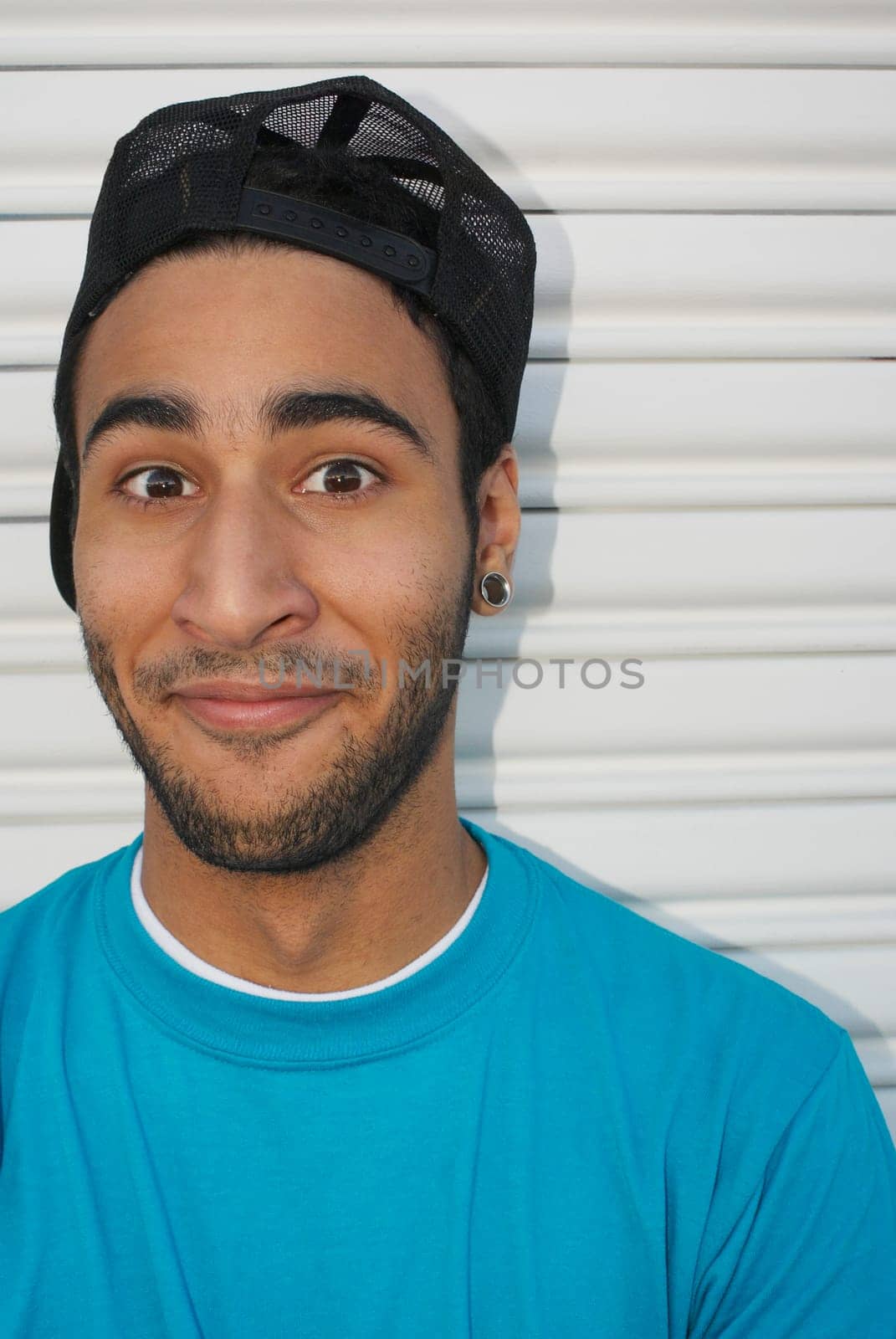 Young man looking at camera