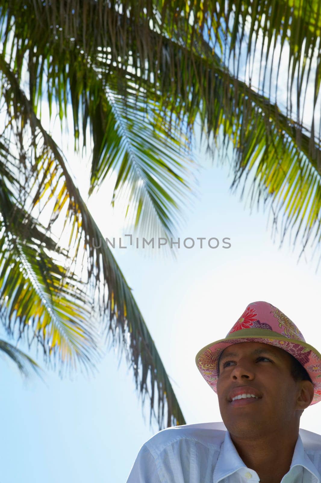 Close-up of a young man wearing a hat