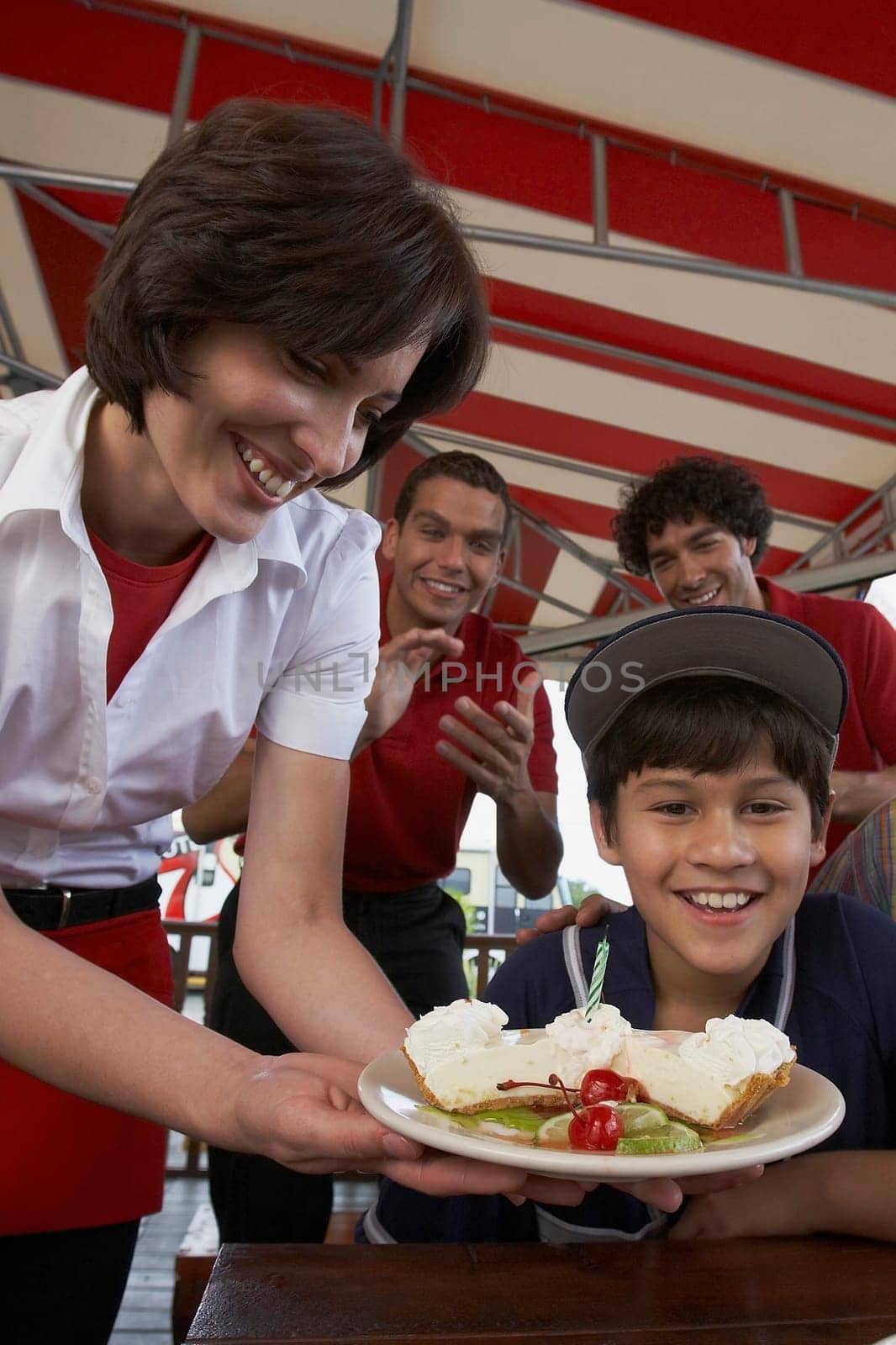 Portrait of a boy celebrating his birthday in a restaurant