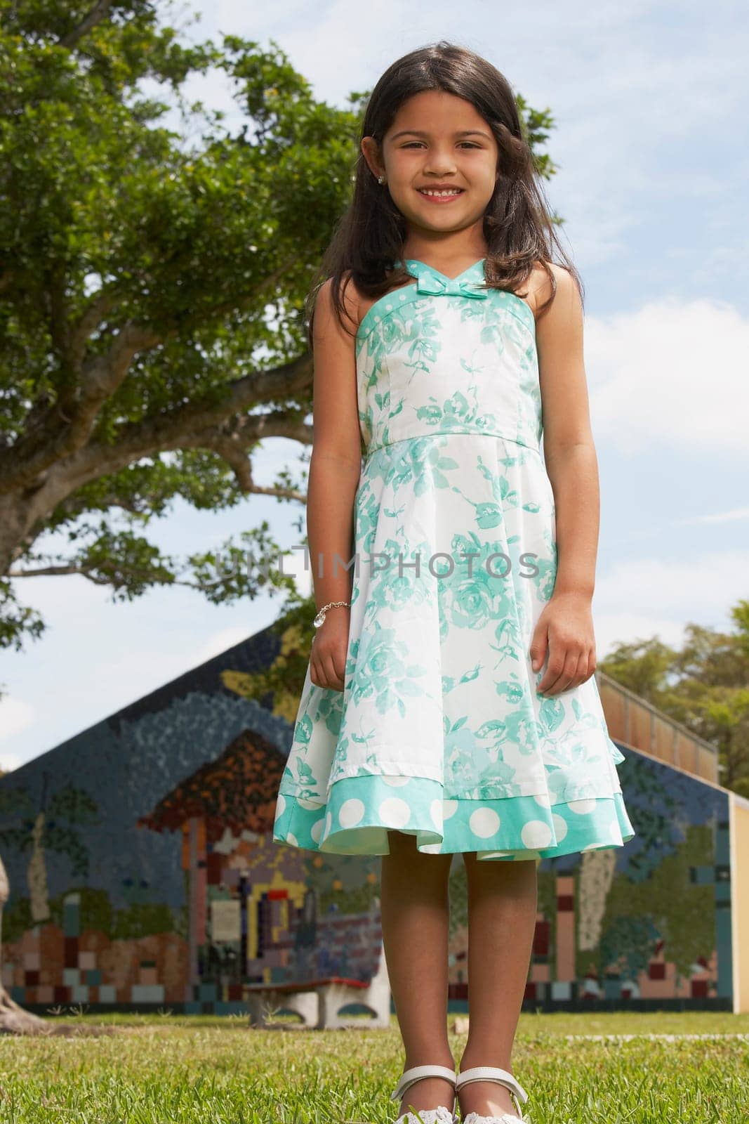 Low angle view of a girl standing in a park