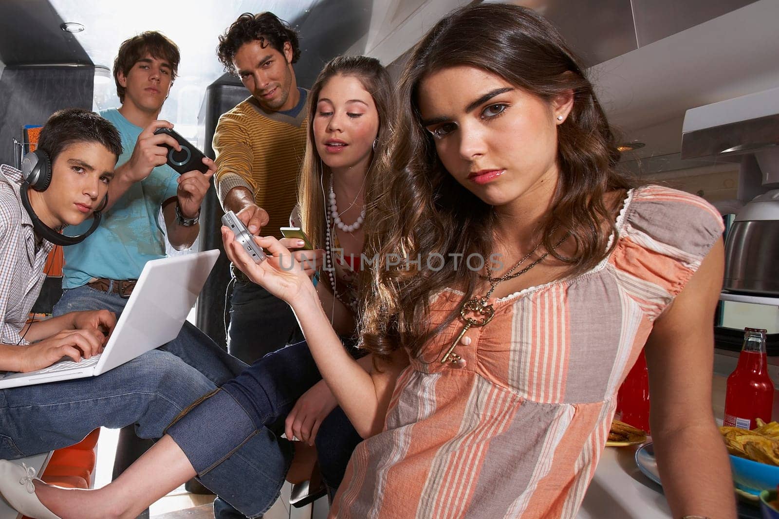 Group of people enjoying in a camper van