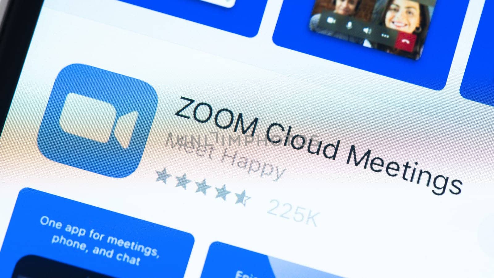 BAYONNE, FRANCE - CIRCA JANUARY 2021: Zoom app page in the App Store on Apple iPhone screen. Zoom is software program for video and audio conferencing, chat, and webinars.