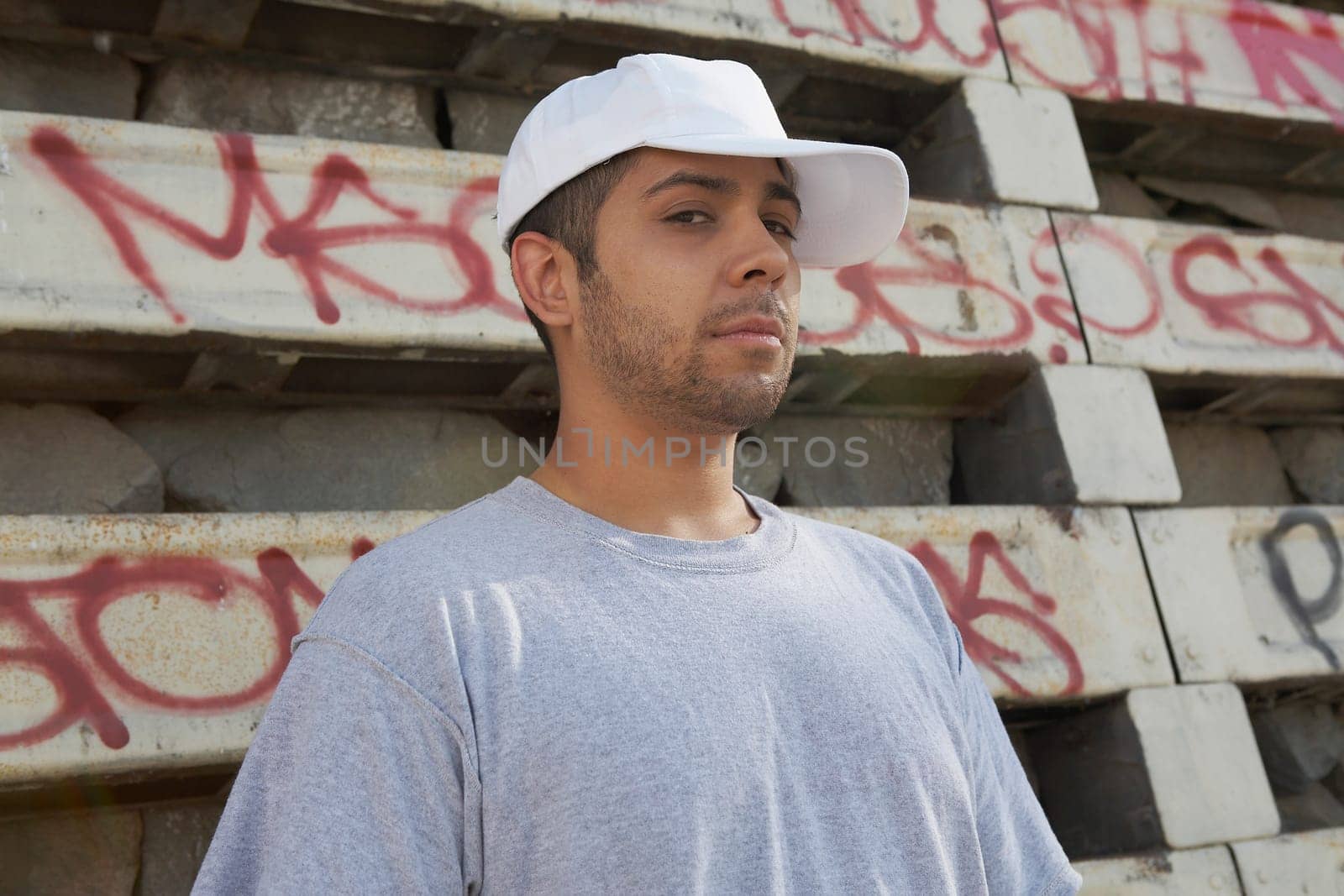Portrait of a young man wearing a cap