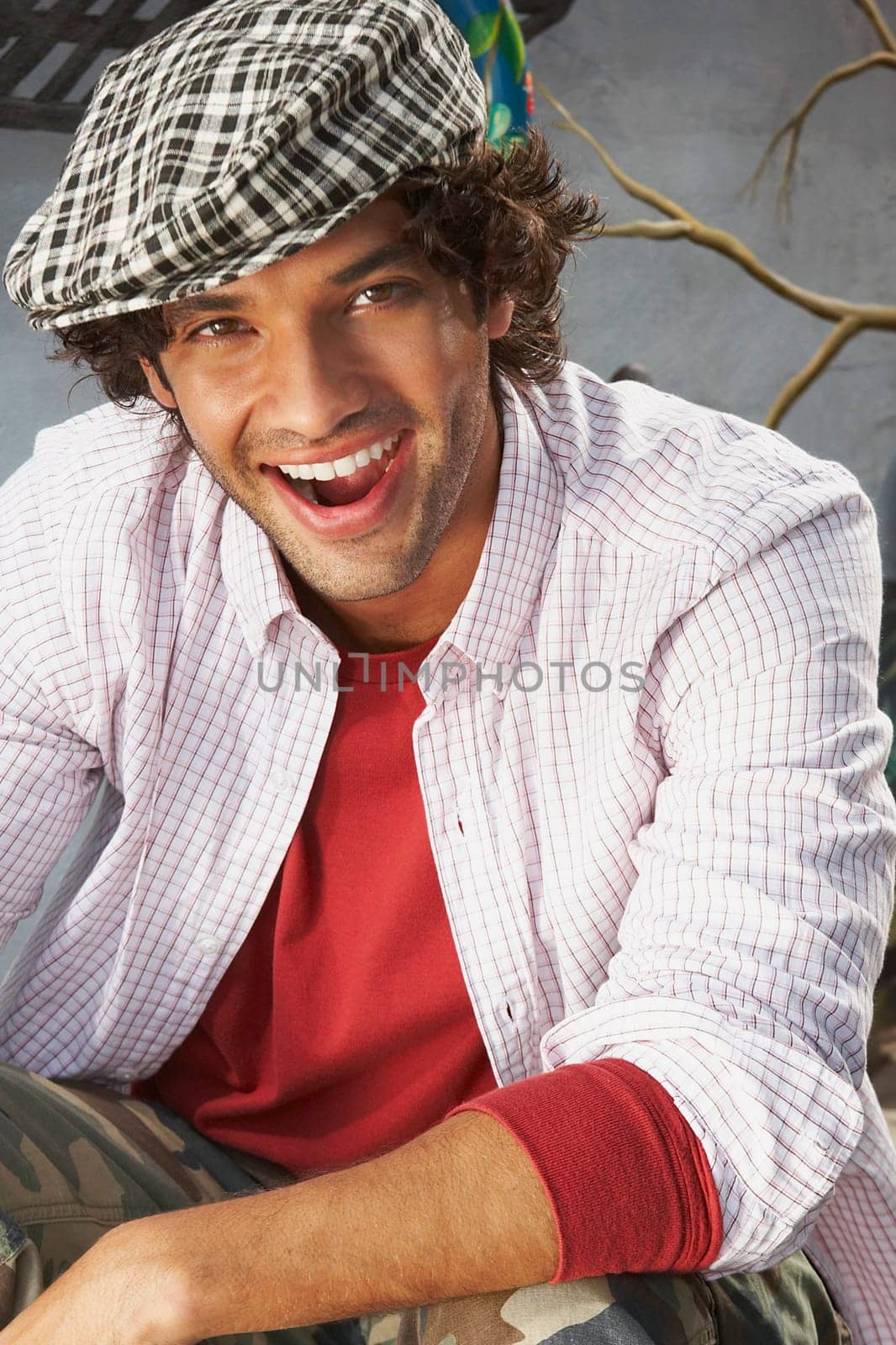 Portrait of a young man laughing
