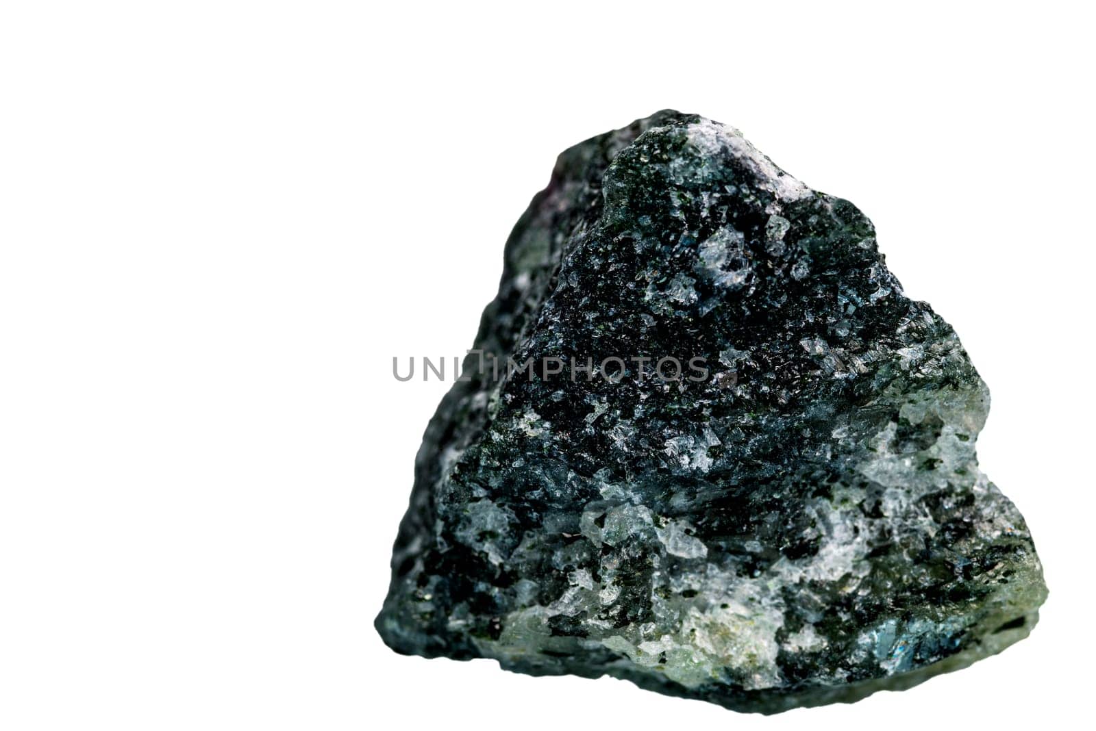 Zoisite, closeup of the gemstone cut out on a white background