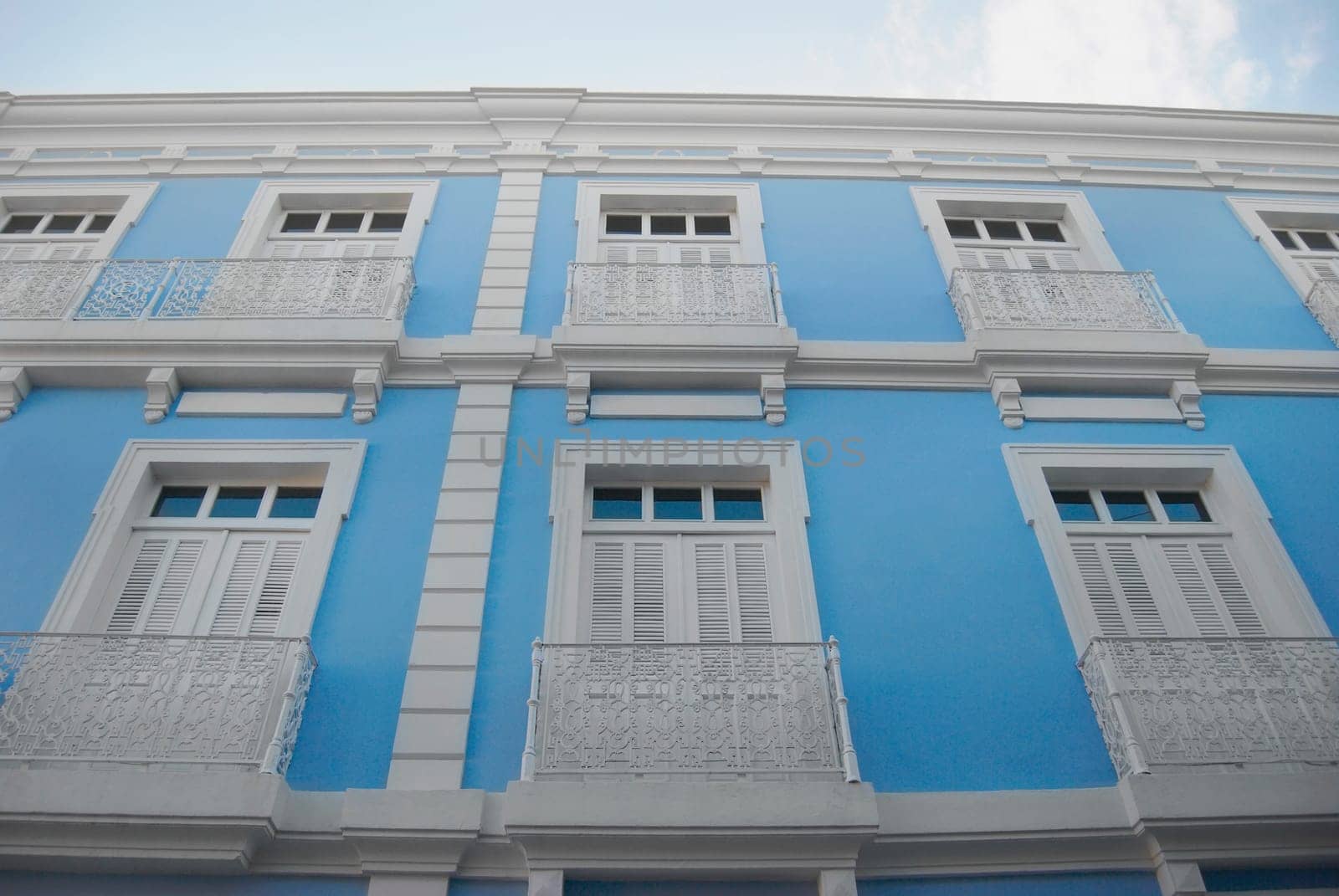 Low angle view of closed windows of a building