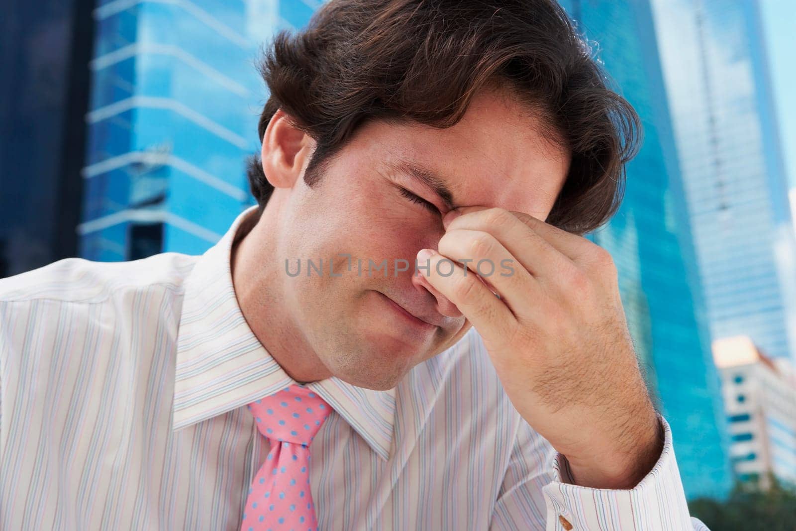 Close-up of a businessman looking sad