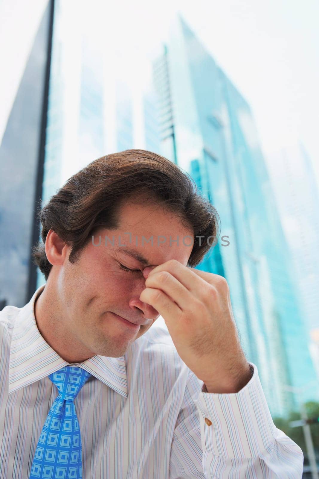 Close-up of a businessman looking sad
