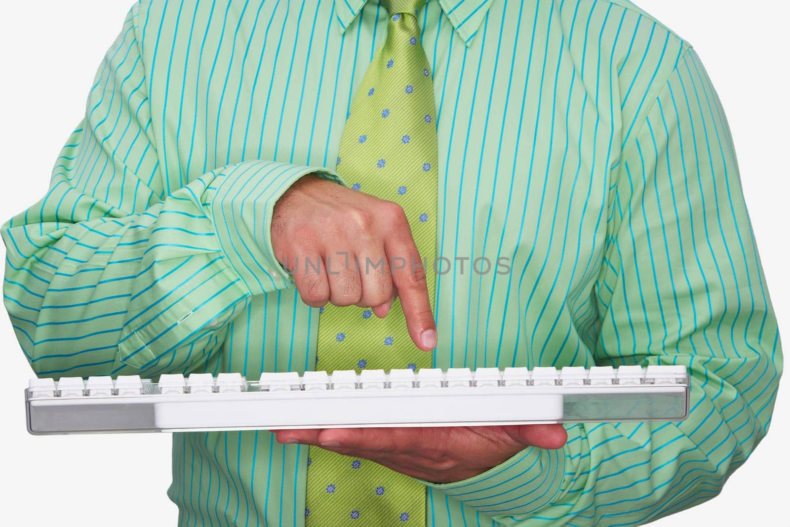 Mid section view of a businessman using a computer keyboard