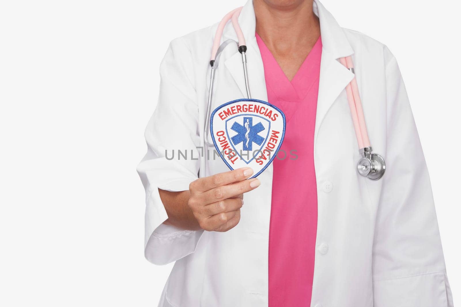 Mid section view of a female doctor showing a badge