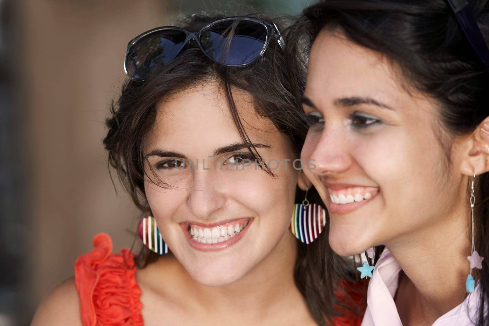 Close-up of two young women smiling