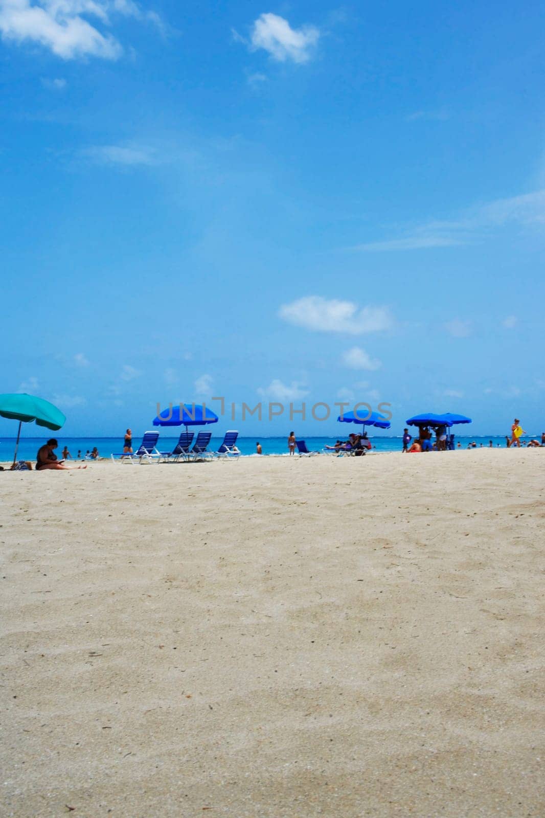 Group of people on the beach, Luquillo Beach, Puerto Rico