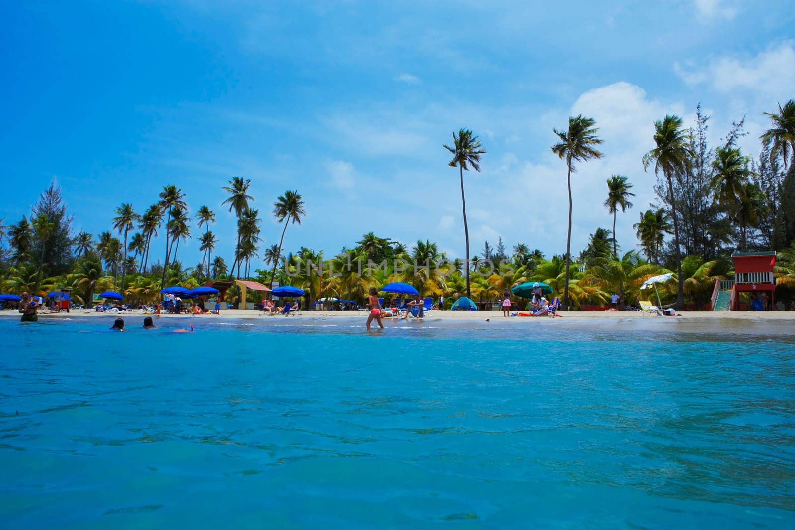 Group of people on the beach, Luquillo Beach, Puerto Rico