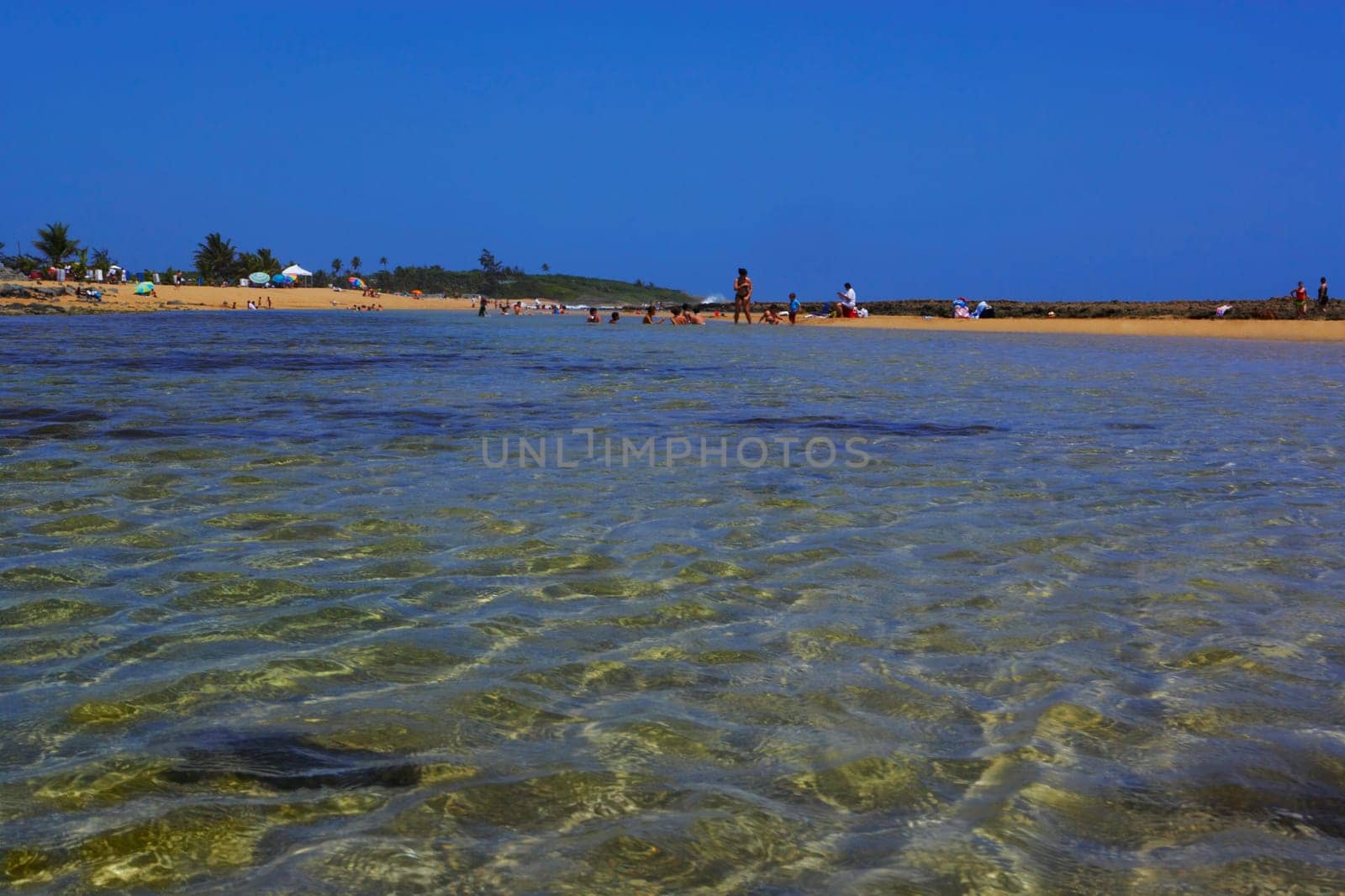Group of people on the beach, Pinones Beach, Puerto Rico