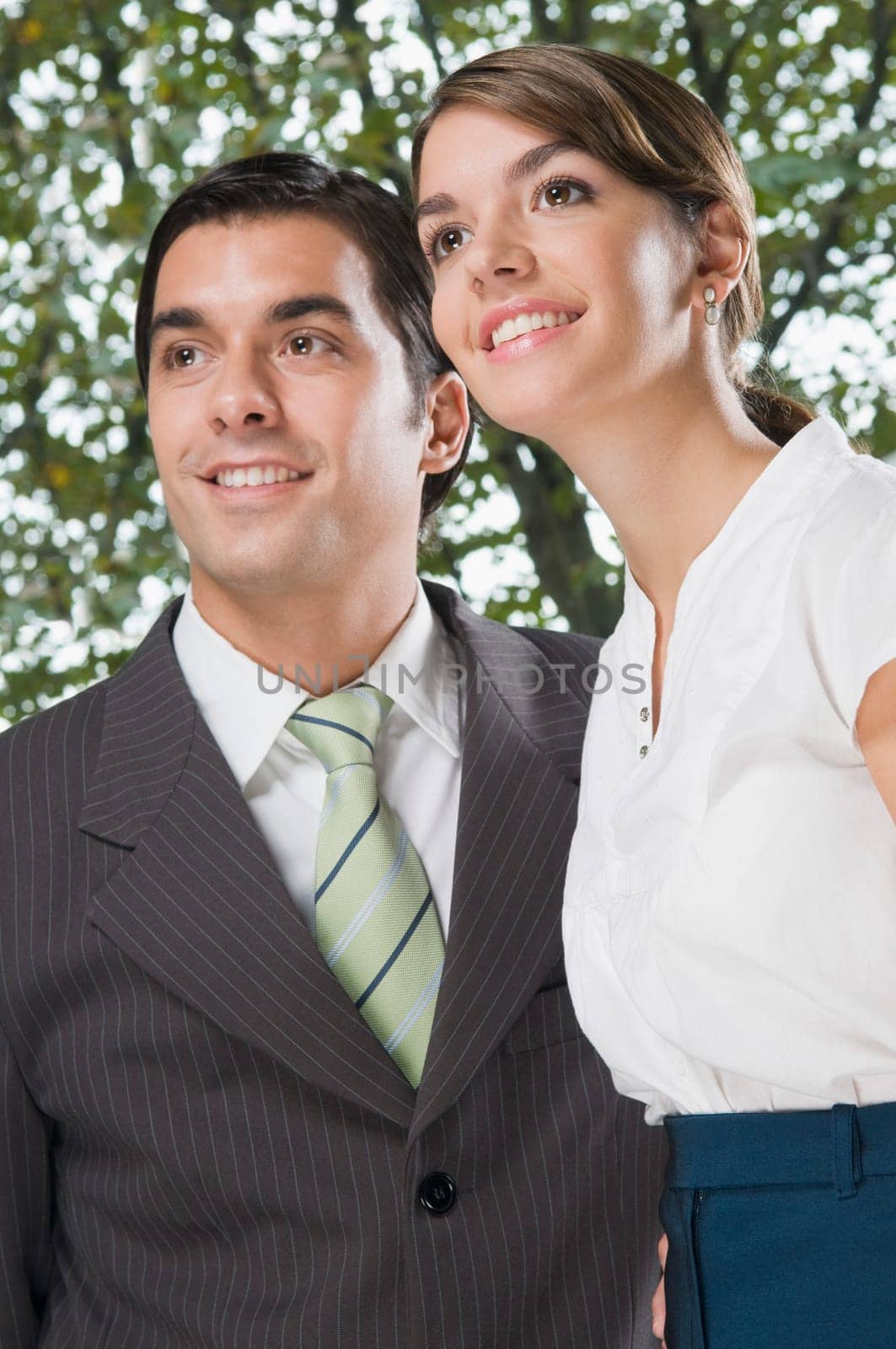 business executives smiling in an office