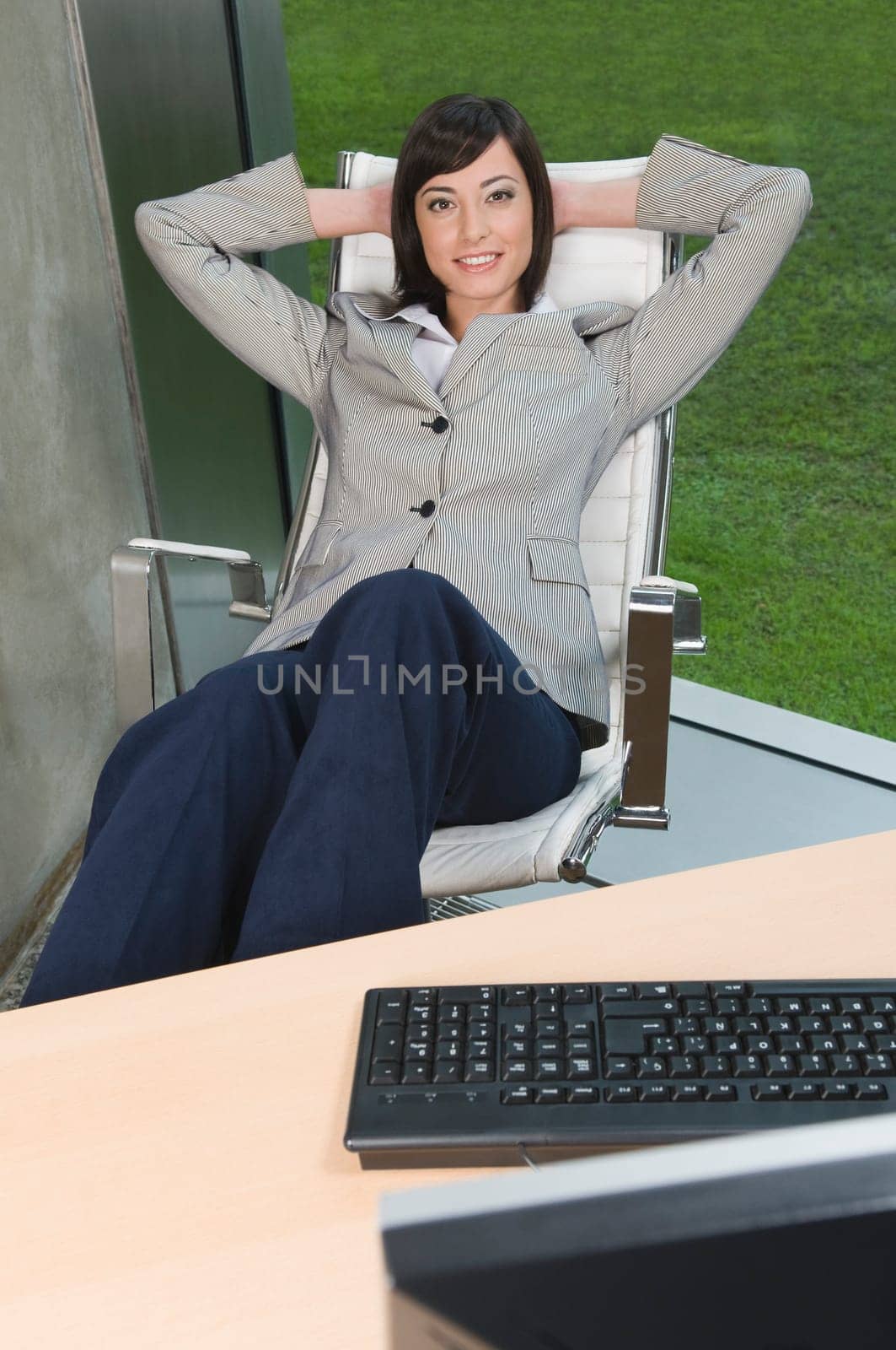 Businesswoman relaxing in an office