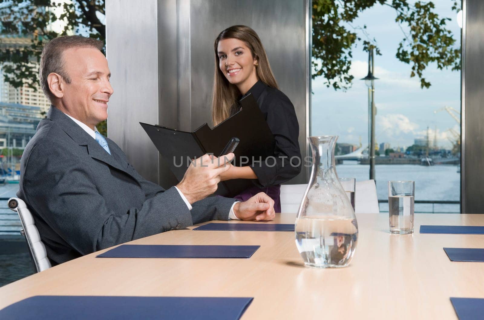 Businessman with his secretary in a meeting
