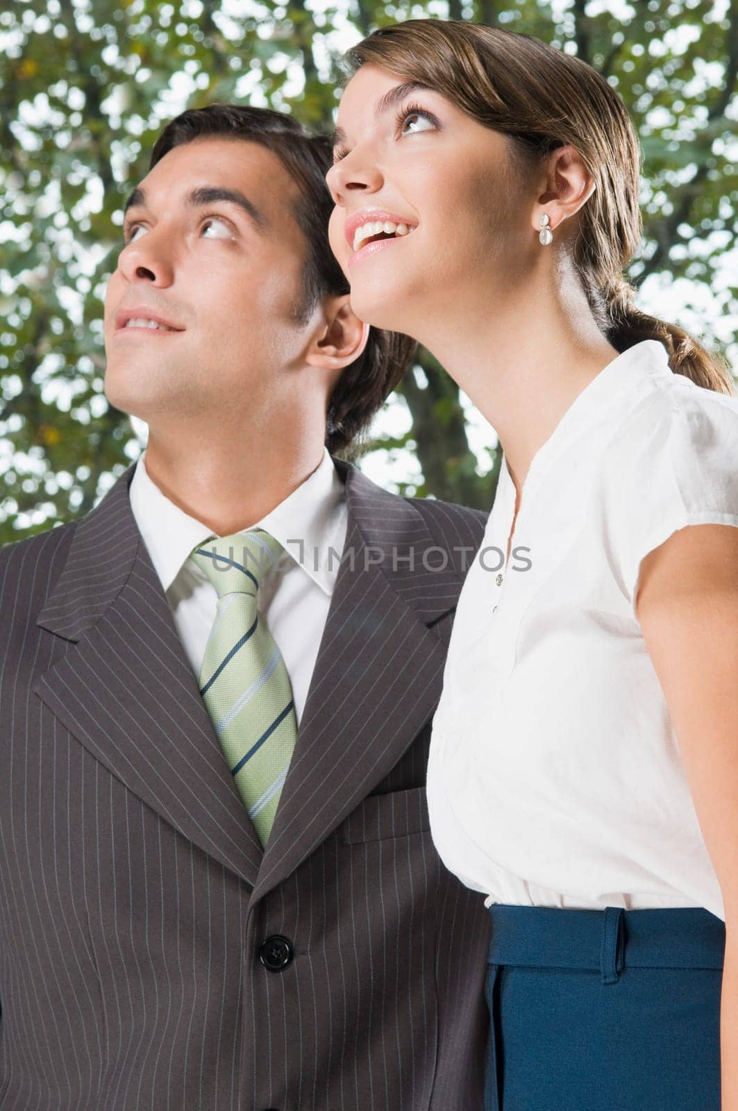 business executives looking up in an office