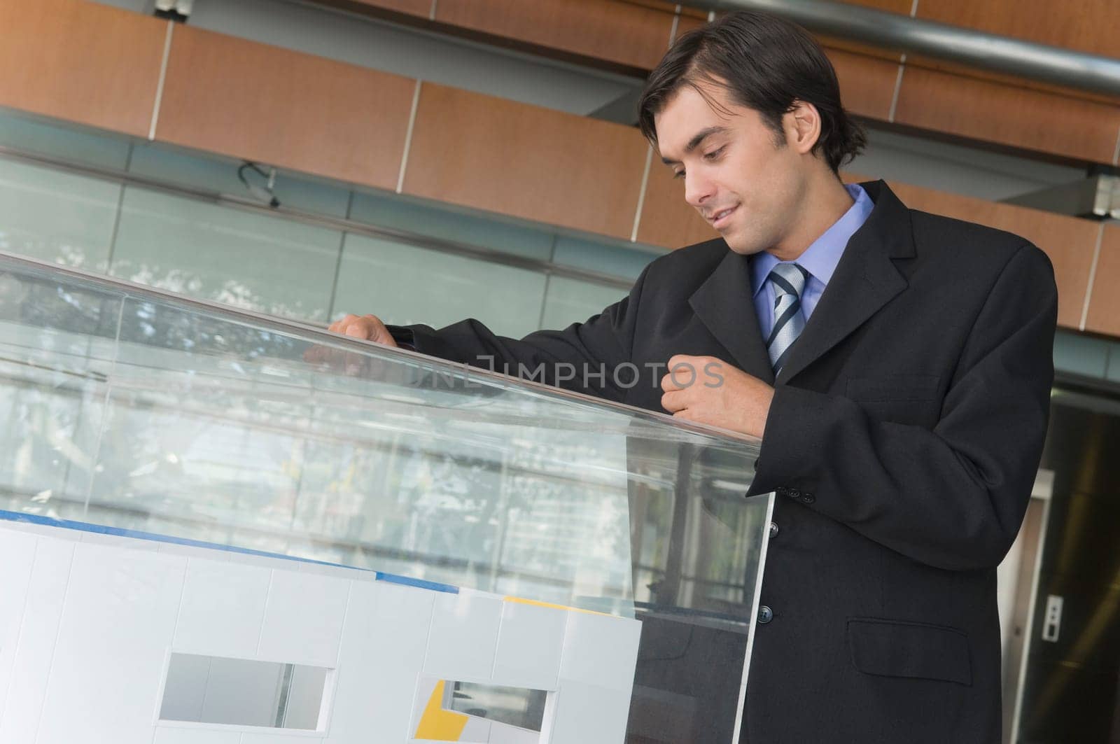 Businessman looking at an architectural model