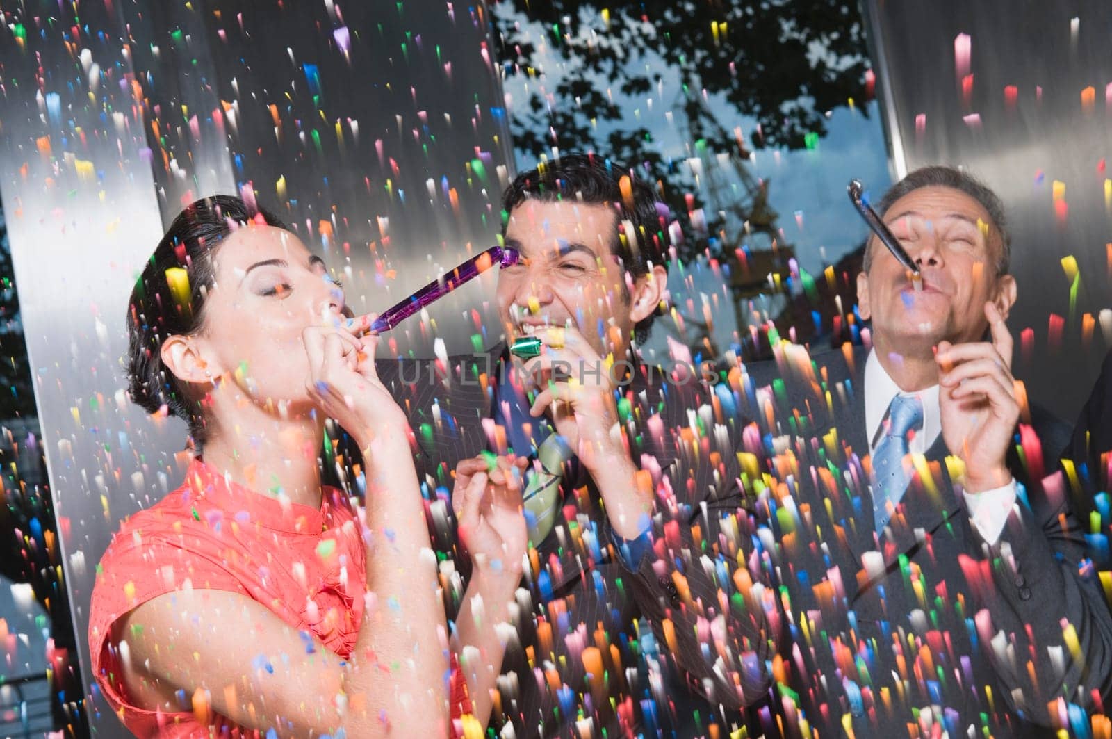 Business executives enjoying a party in an office