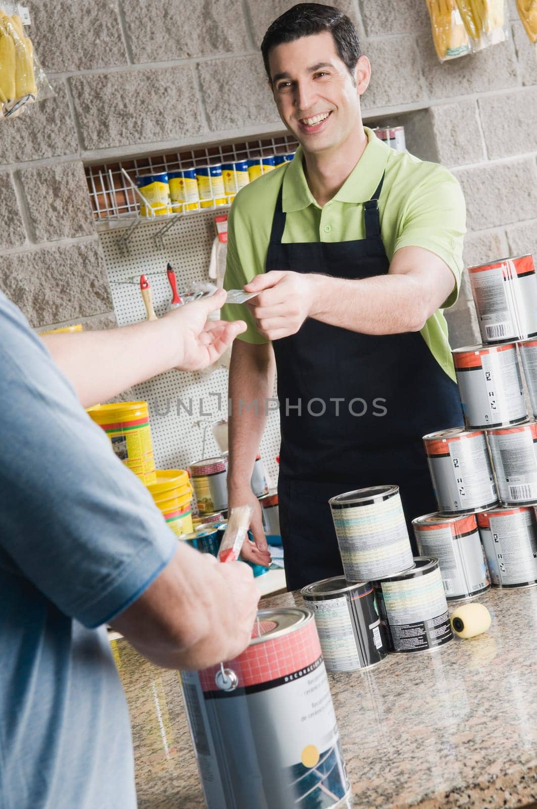 Man paying with a credit card in a hardware store