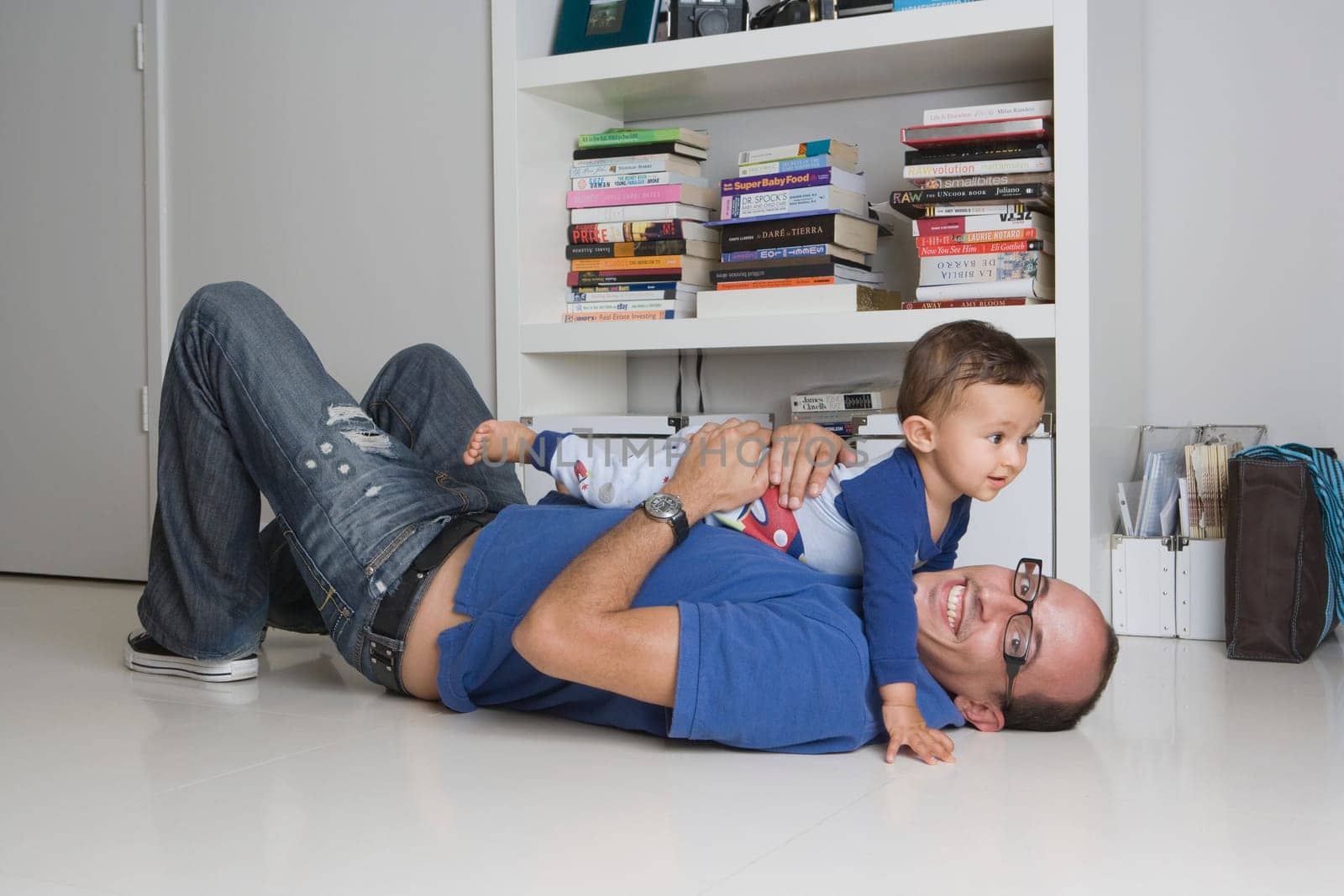 Man playing with his son