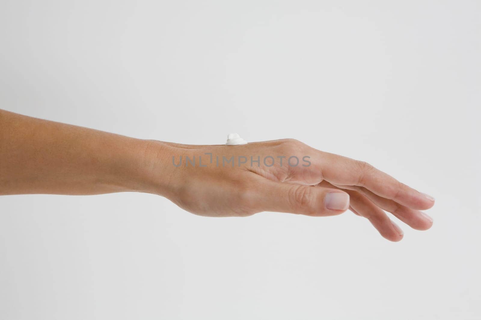 Close-up of moisturizer on a woman's hand