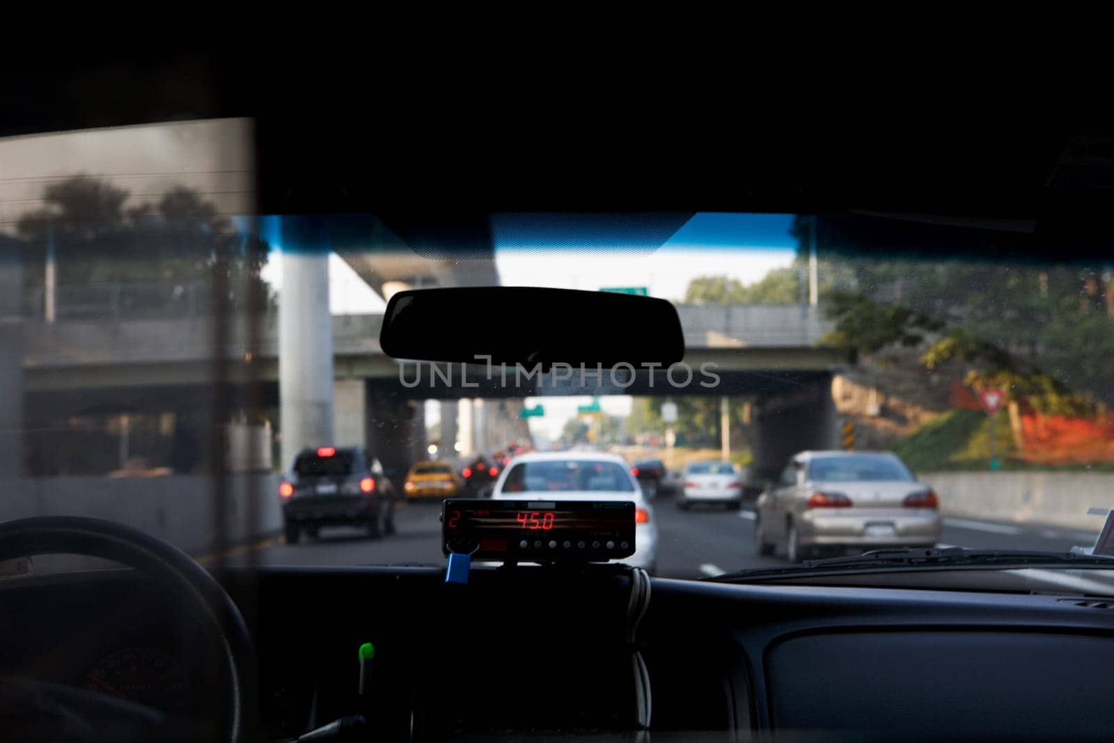 Cab meter on the dashboard of a car