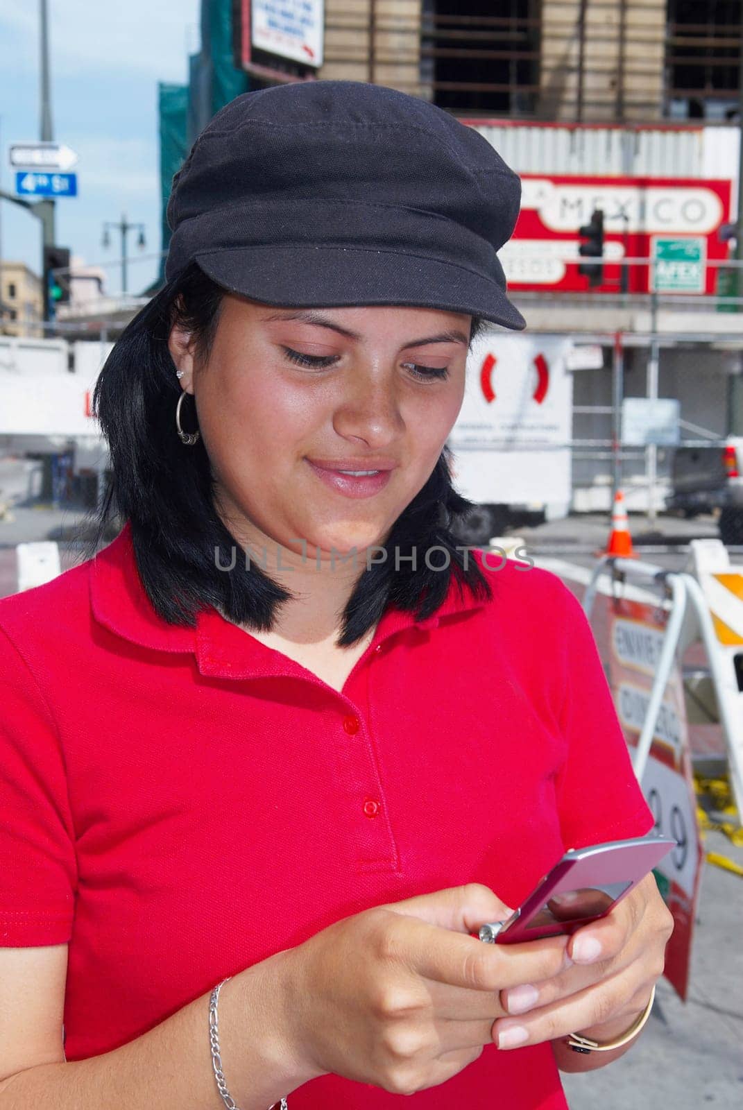 Close-up of a young woman using a mobile phone