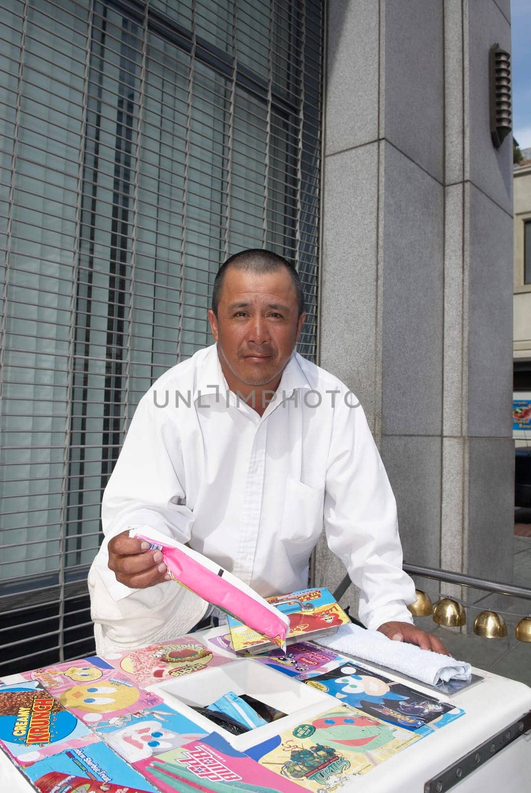 Portrait of a market vendor selling ice-cream, City Of Los Angeles, California, USA