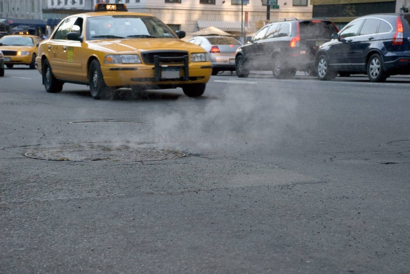 Smoke coming out of a manhole