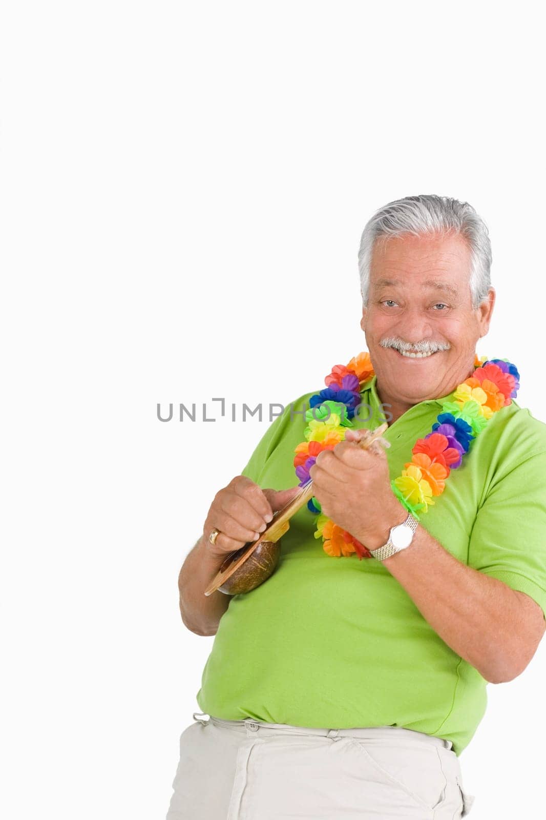 Portrait of a senior man playing ukulele and smiling