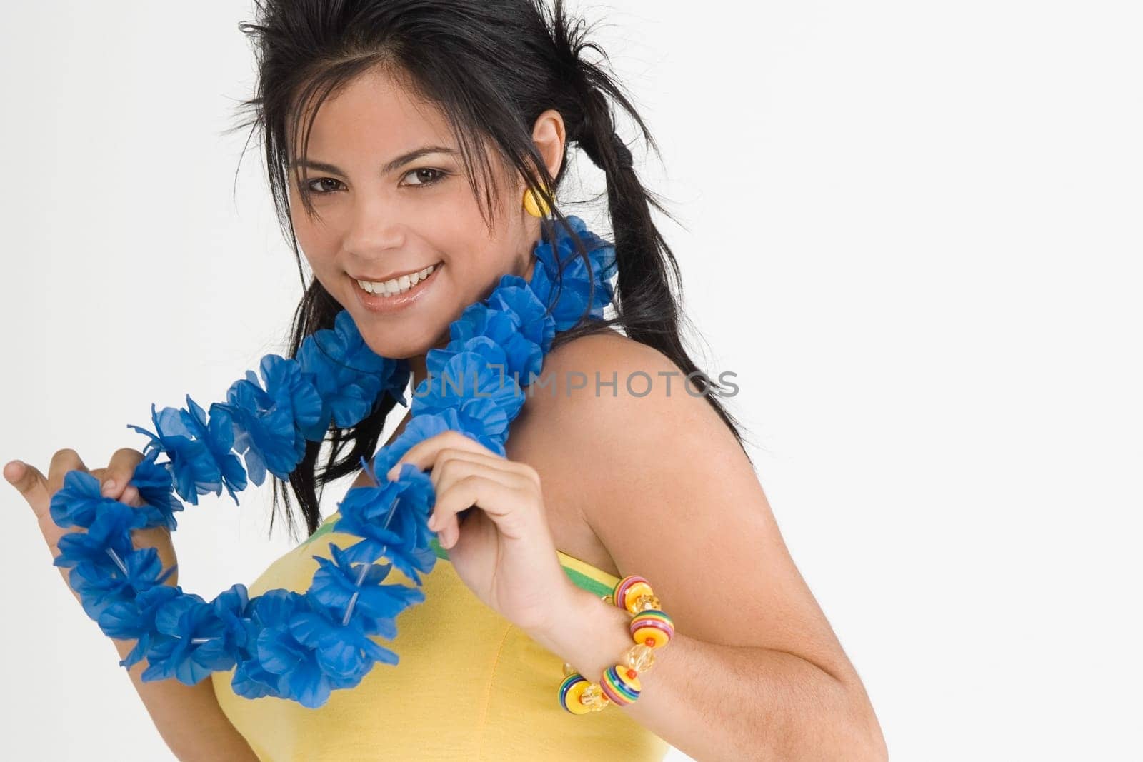 Portrait of a young woman wearing a garland and smiling