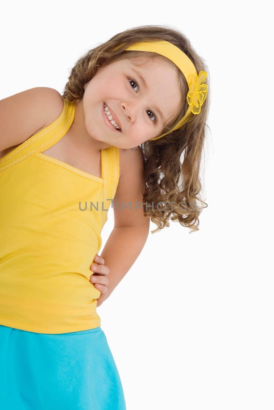 Portrait of a girl smiling with arms akimbo