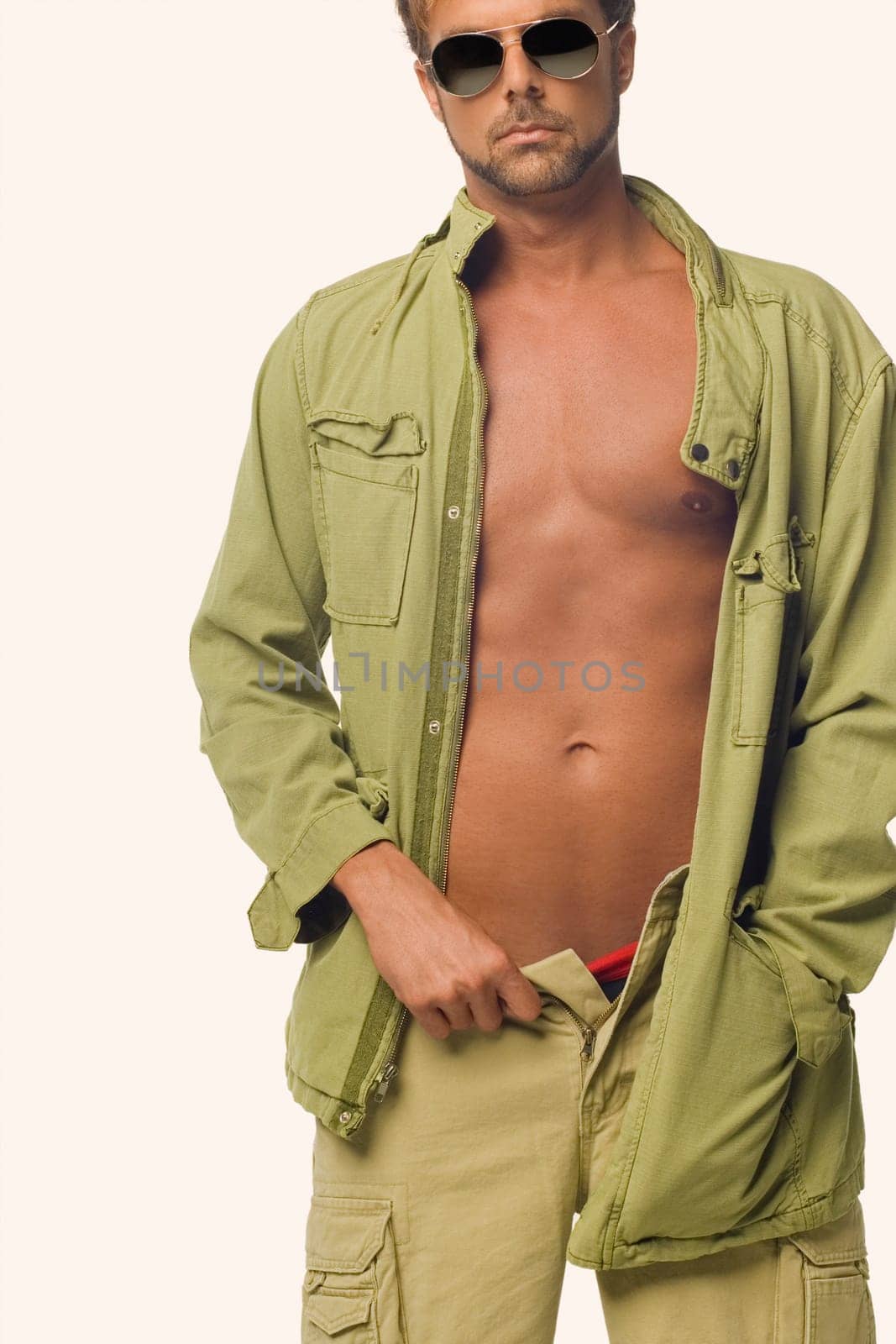Mid adult man standing with his one hand in his pocket