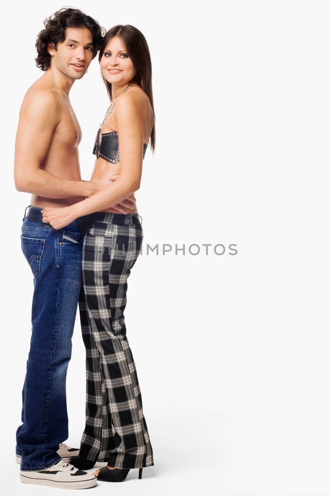 Portrait of a young couple standing together and smiling