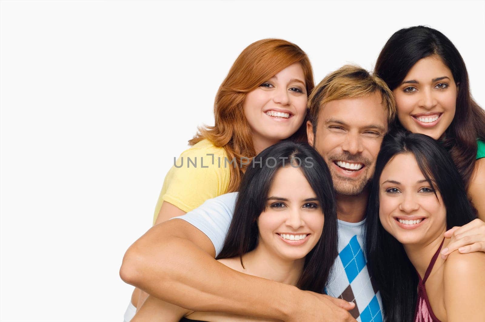 Portrait of a mid adult man posing with four young women