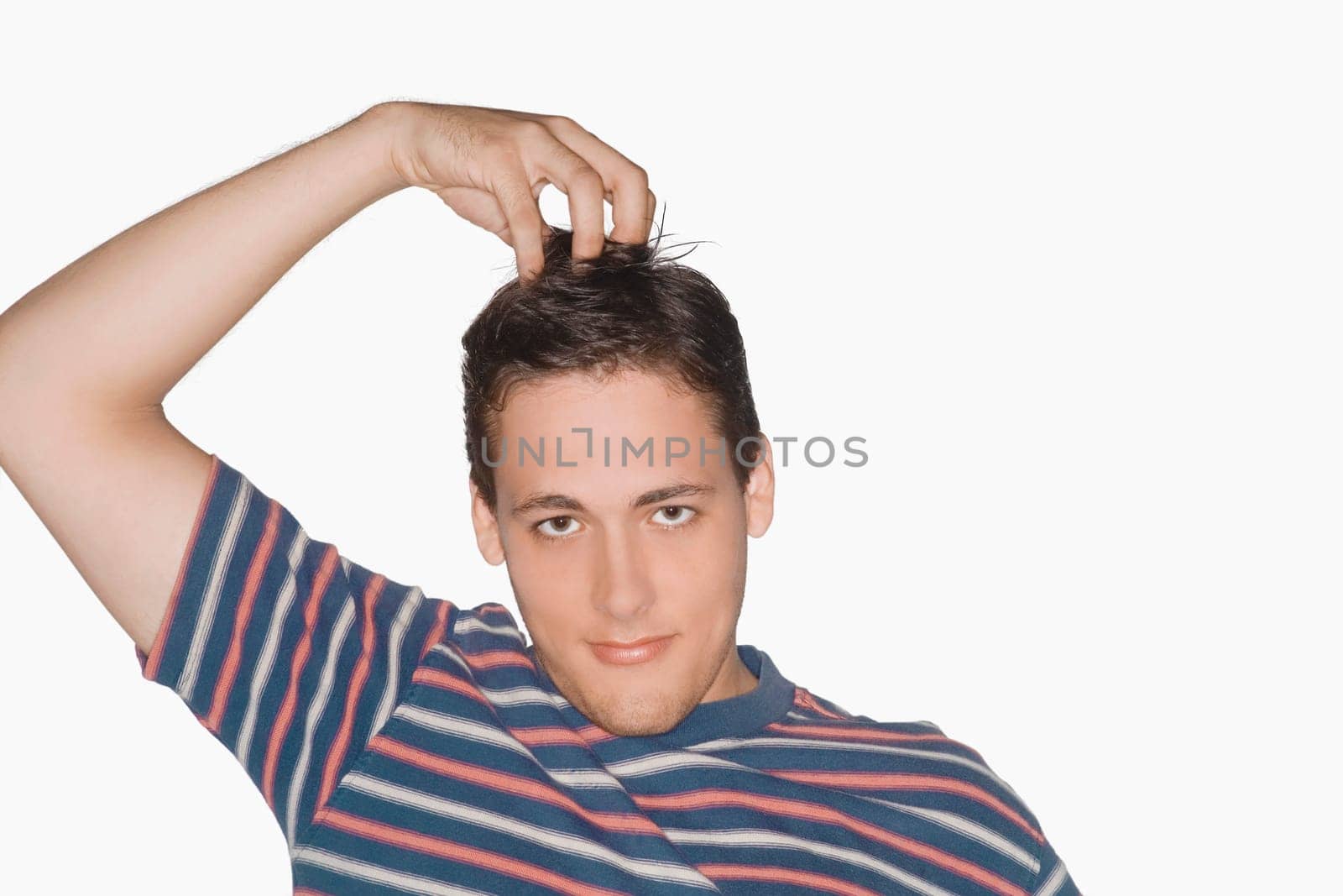 Portrait of a young man smirking