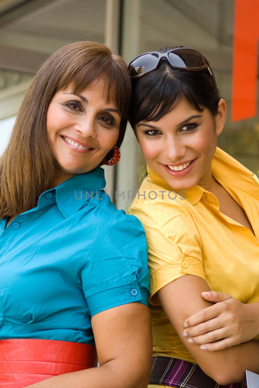 Portrait of a mature woman smiling with her daughter