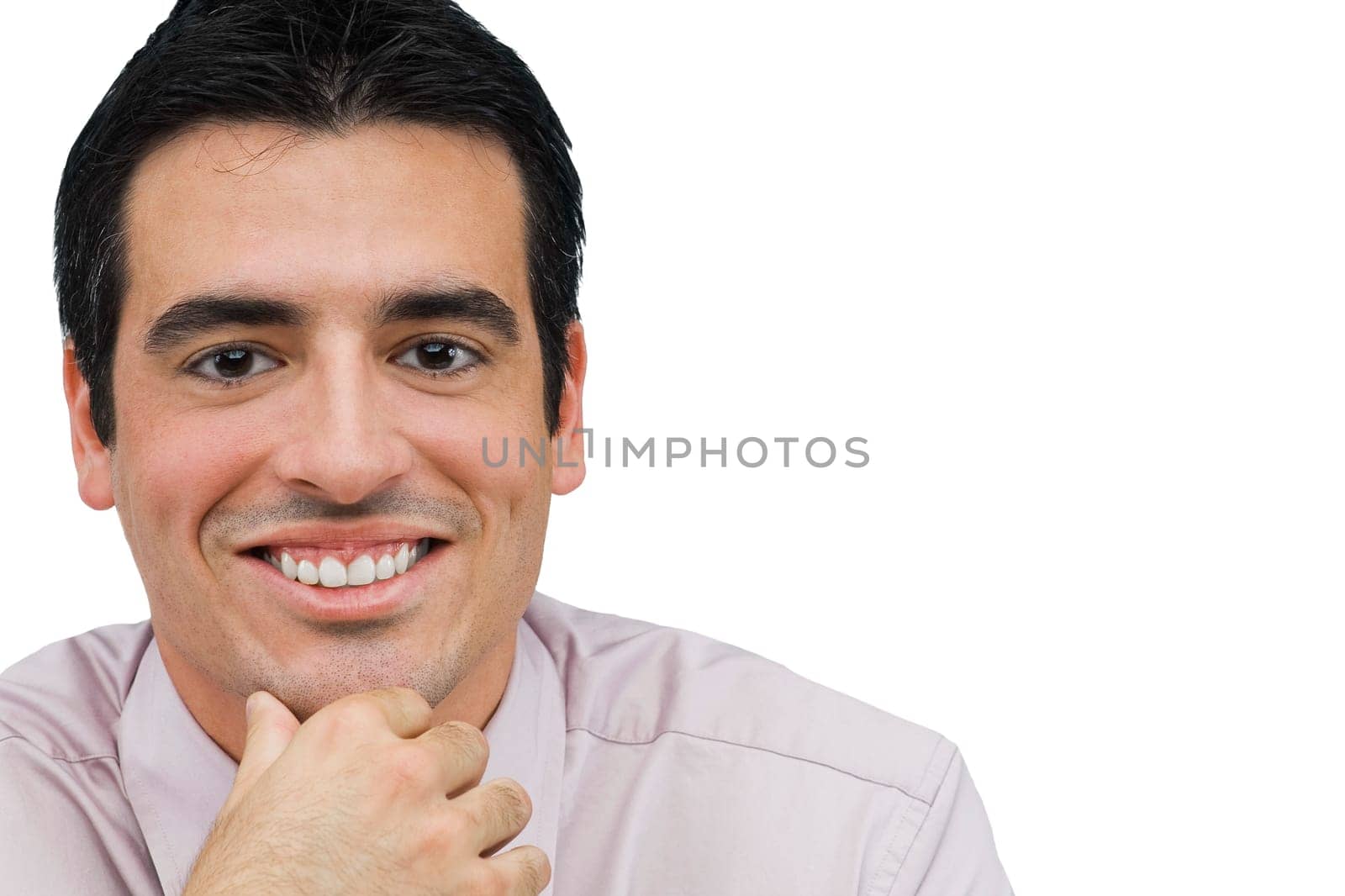 Portrait of a businessman smiling with his hand on his chin