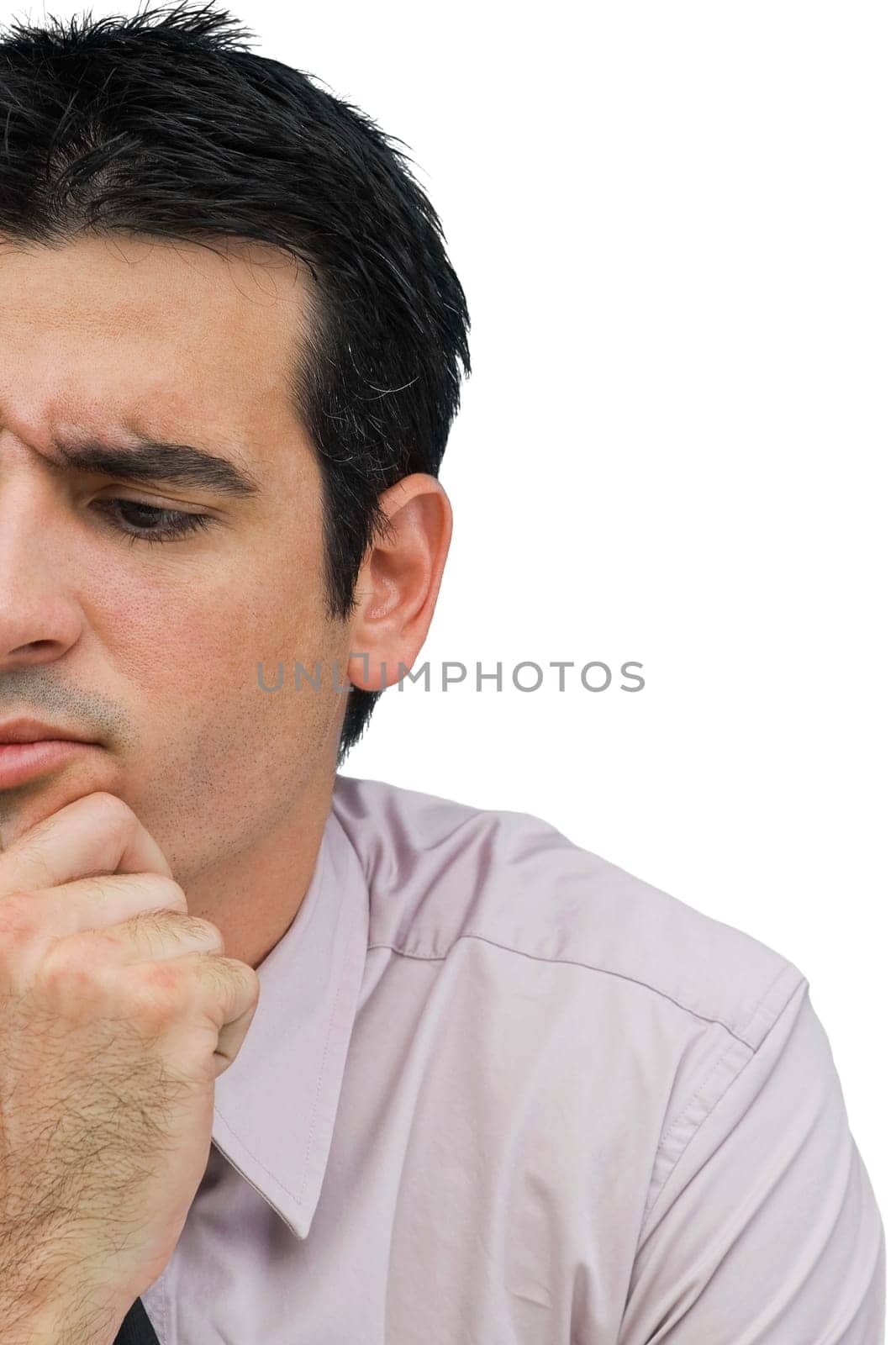 Close-up of a businessman thinking with his hand on his chin