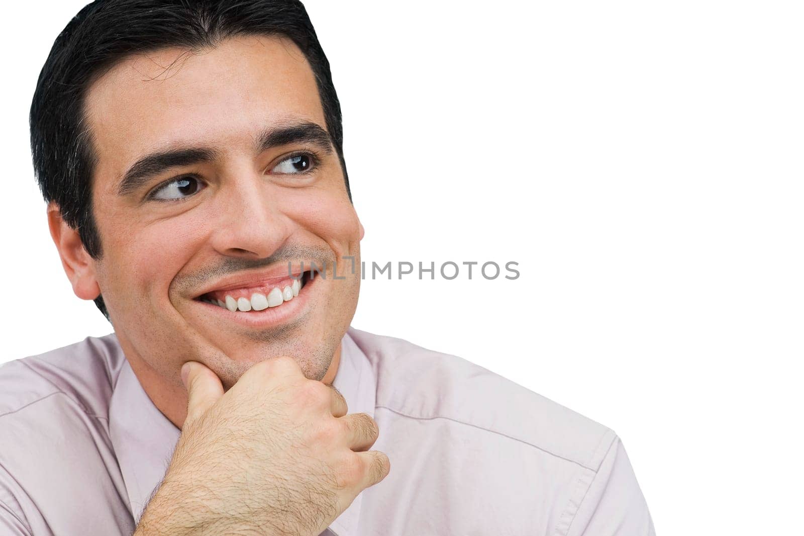 Close-up of a businessman smiling with his hand on his chin